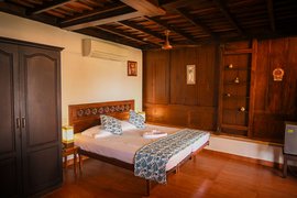 Schlafzimmer der Zimmerkategorie "Kerala House"