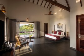 Das großzügige Zimmer Idha im traditionellen Kerala Stil