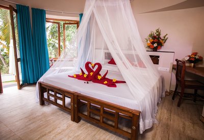 Liebevoll gestaltete Zimmer heißen Sie im Somatheeram Ayurvedic Health Resort herzlich willkommen