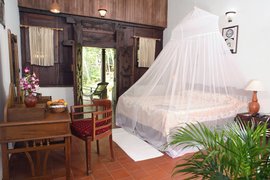 Wohnen Sie in den traditioniellen eingerichten Zimmer im Somatheeram Health Wohnen Sie in den traditioniellen eingerichten Zimmer im Somatheeram Health