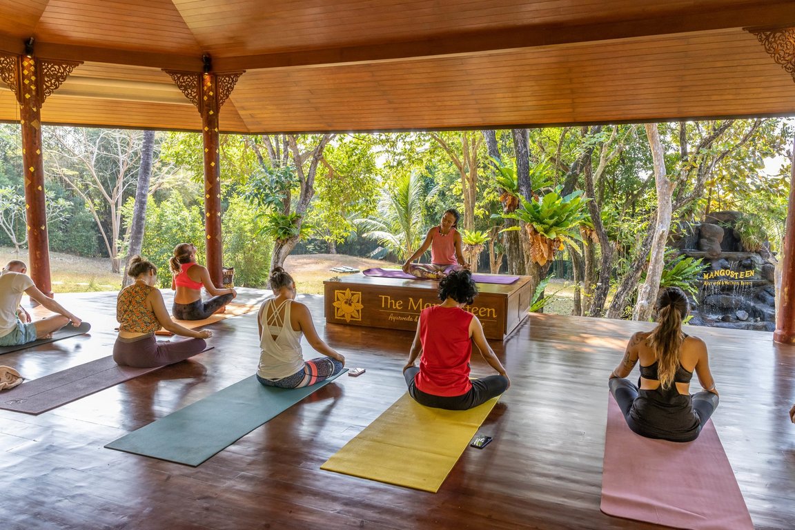 Open-air yoga class at Mangosteen Ayurveda and Wellness Resort in Phuket