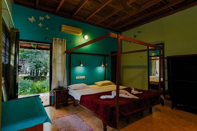 Direkt von Ihrem Zimmer gelangen Sie in den Garten des Athreya Ayurvedic Centre Hotel