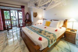 Die Zimmer der Hiru Villa schaffen eine angenehme Atmosphäre Die Zimmer der Hiru Villa schaffen eine angenehme Atmosphäre